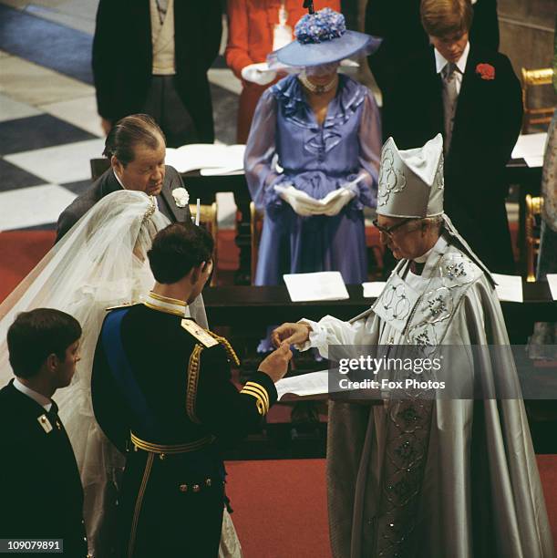 The wedding of Charles, Prince of Wales, and Lady Diana Spencer at St Paul's Cathedral in London, 29th July 1981. Prince Andrew is beside his brother...