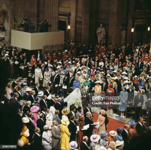 The wedding of Charles, Prince of Wales, and Lady Diana Spencer in St Paul's Cathedral, London, 29th July 1981. The bride arrives on the arm of her...