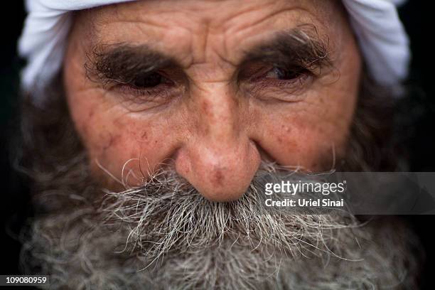 Druze man attends a rally at the village of Majdel Shams near the border between Israel and Syria on February 14, 2011 in Golan Heights. The annual...