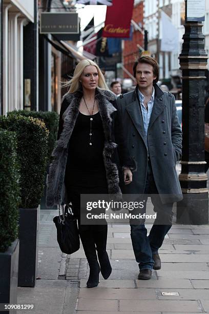 Emma Noble and her fiance Conrad Baker are seen shopping for wedding rings at Tiffany & Co, ahead of their September wedding, on February 14, 2011 in...