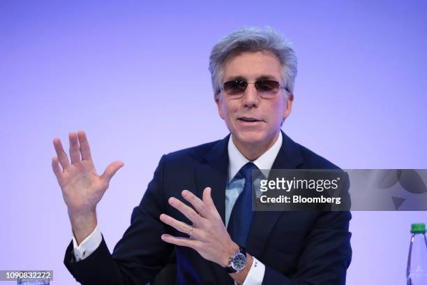 Bill McDermott, chief executive officer of SAP AG, gestures while speaking during a full year earnings news conference at the software companys...