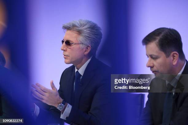 Bill McDermott, chief executive officer of SAP AG, left, speaks as he sits beside Luka Mucic, chief financial officer of SAP SE, during a full year...