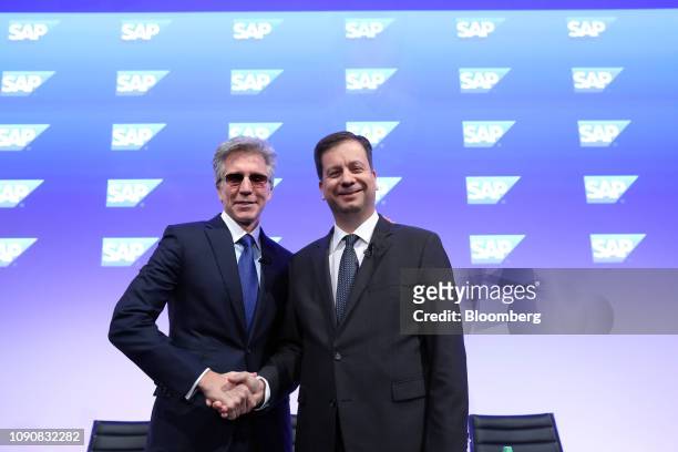 Bill McDermott, chief executive officer of SAP AG, left, and Luka Mucic, chief financial officer of SAP SE, poses for a photograph following a full...
