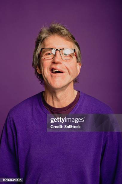portrait senior man - portrait studio purple background stock pictures, royalty-free photos & images