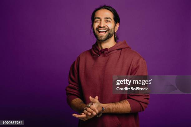 handsome man laughing - colored background stock pictures, royalty-free photos & images