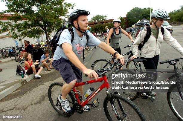 Left to right, Rich McGuire, Erin Bishop and Brianne Fite leave the breakfast station at Ideal Market to ride to work on Bike to Work Day Wednesday.