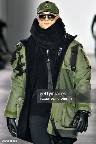 Model walks the runway at the RAEBURN Fall/Winter 2019/2020 fashion show during London Fashion Week Men's January 2019 at the BFC Show Space on...