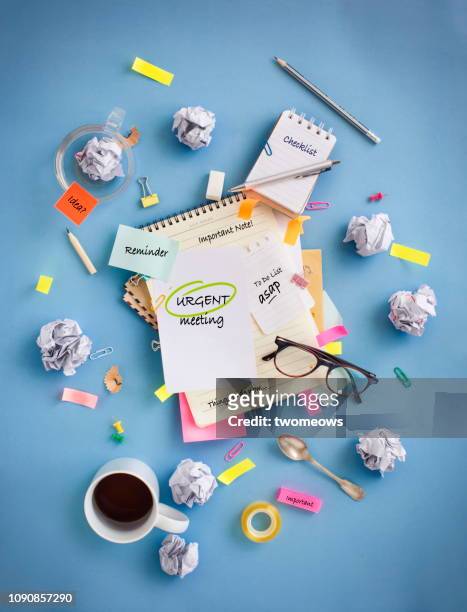 messy office table top objects image. - busy schedule stock pictures, royalty-free photos & images