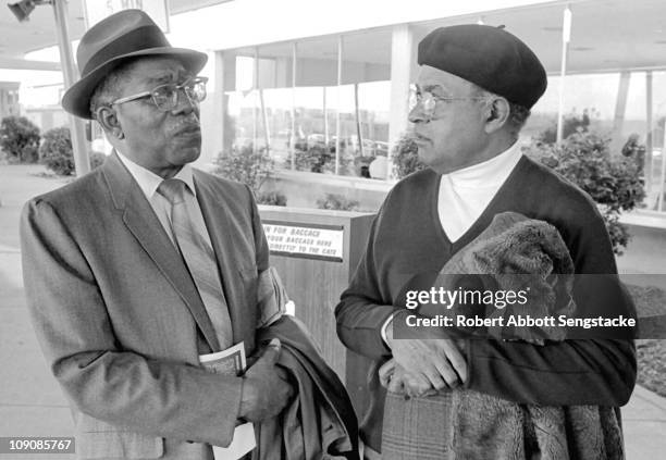 At left, Harlem Renaissance painter Aaron Douglas and influential filmmaker Carlton Moss attend the Black Esthetics show at the Museum of Science and...