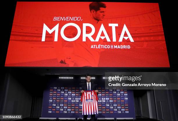 Alvaro Morata of Club Atletico de Madrid poses with his new shirt during the Club Atletico de Madrid player presentation of Alvaro Morata at Wanda...