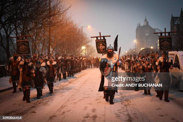 Guizer Jarl, John Nicholson leads his squad through the streets of Lerwick, Shetland Islands on January 29, 2019 before the Up Helly Aa festival...