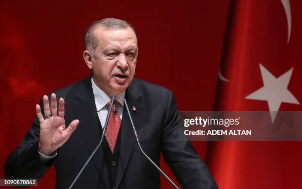 Turkish President Recep Tayyip Erdogan addresses a meeting of provincial election officials at the headquarters of his ruling Justice and Development...