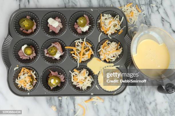 egg bites - muffin tin stock pictures, royalty-free photos & images