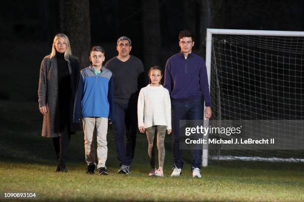 Casual portrait of New York City FC director of football operations Claudio Reyna and his wife, Danielle Egan Reyna, posing with their children...