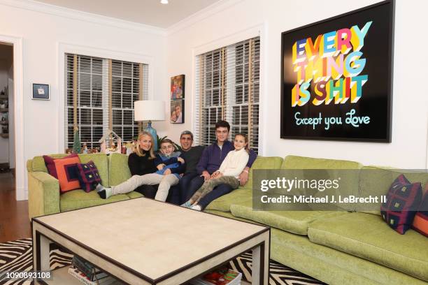 Casual portrait of New York City FC director of football operations Claudio Reyna and his wife, Danielle Egan Reyna, posing with their children...