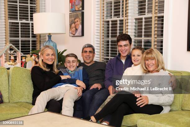 Casual portrait of New York City FC director of football operations Claudio Reyna and his wife, Danielle Egan Reyna, posing with their children...