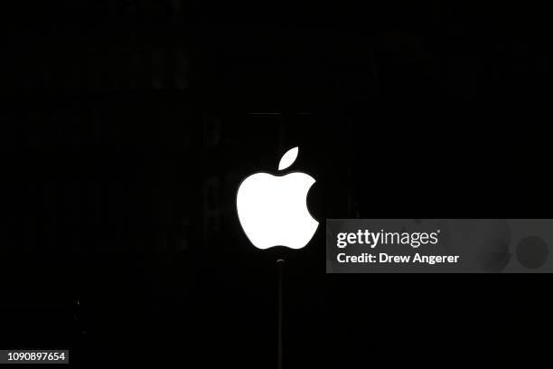 An Apple logo is displayed in an Apple retail store in Grand Central Terminal, January 29, 2019 in New York City. Apple is set to report...