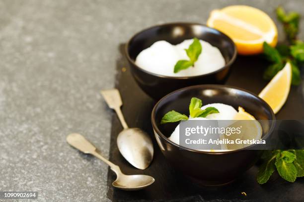 lemon ice cream in bowl - sorbet stock pictures, royalty-free photos & images