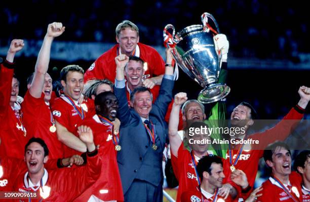 Sir Alex Ferguson head coach and Players of Manchester celebrates victory during the UEFA Champions league final match between Manchester United and...