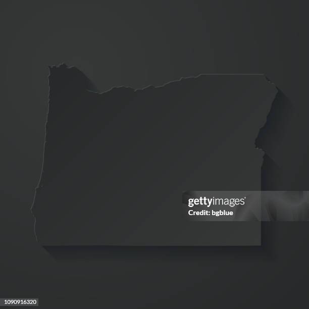 illustrazioni stock, clip art, cartoni animati e icone di tendenza di mappa dell'oregon con effetto taglio carta su sfondo nero - stato delloregon