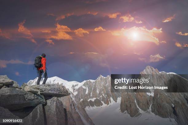 hiker enjoying scenery, chamonix-mont-blanc, rhone-alpes, france - be boundless summit stock pictures, royalty-free photos & images