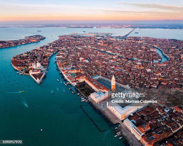 aerial view of venice at sunset, italy - venice italy stock pictures, royalty-free photos & images