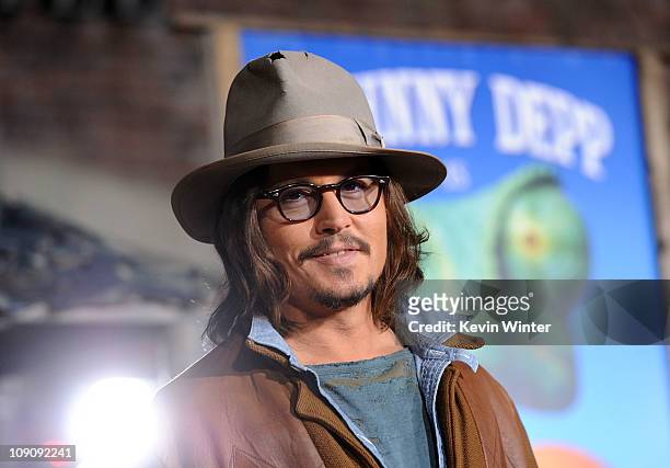 Actor Johnny Depp arrives at the premiere of Paramount Pictures' "Rango" at the Regency Village Theater on February 14, 2011 in Los Angeles,...