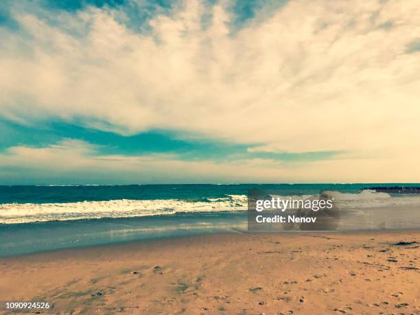 view of beach and clouds in pomorie, bulgaria. - burgas stock pictures, royalty-free photos & images