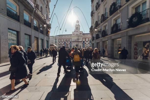 crowds walking through the city - "marilyn nieves" stock pictures, royalty-free photos & images