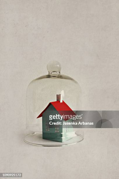 paper house under a bell jar - bell jar ストックフォトと画像