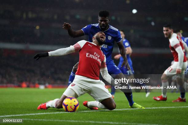 Alexandre Lacazette of Arsenal goes down but match referee Mike Dean doesn't award a penalty during the Premier League match between Arsenal FC and...