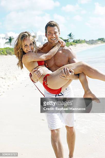 Swimsuit Issue 2011: Contestants Brad Womack and Ashley Hebert from the TV reality show "The Bachelor" pose for the 2011 Sports Illustrated Swimsuit...