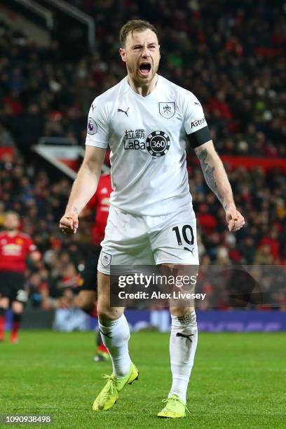 Ashley Barnes of Burnley celebrates after scoring his team's first goal during the Premier League match between Manchester United and Burnley at Old...