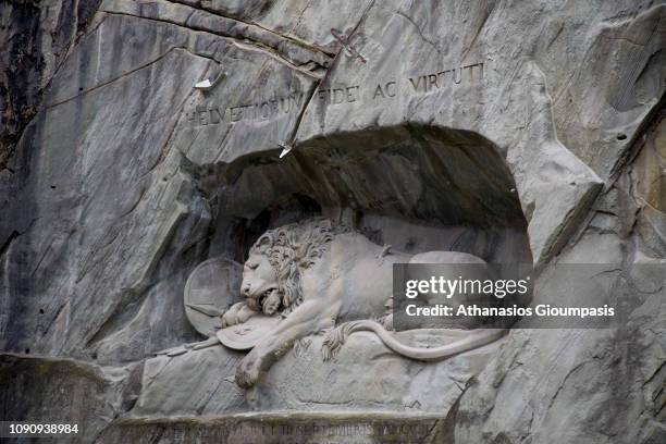 The Lion Monument or the Lion of Lucerne on December 30, 2018 in Lucerne, Switzerland. The Lion Monument is a rock relief in Lucerne, Switzerland,...