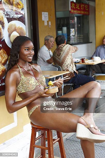 Swimsuit Issue 2011: Model Damaris Lewis poses for the 2011 Sports Illustrated Swimsuit issue on November 18, 2010 on Sentosa Island in Singapore....