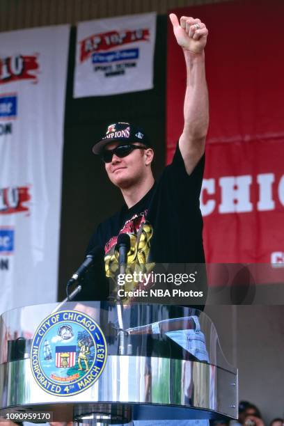 Luc Longley of the Chicago Bulls talks at the Chicago Bulls Championship Parade and Rally on June 16, 1997 at Grant Park in Chicago, Illinois. NOTE...