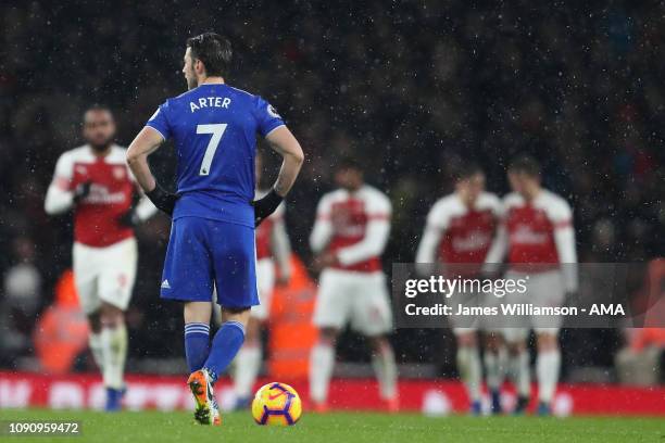 Harry Arter of Cardiff City dejected after Pierre-Emerick Aubameyang of Arsenal scores a goal to make it 1-0 during the Premier League match between...