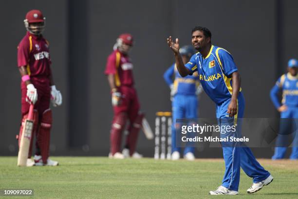 Muttiah Muralitharan of Sri Lanka during the 2011 ICC World Cup warm up match between Sri Lanka and West Indies at R. Premadasa Stadium on February...