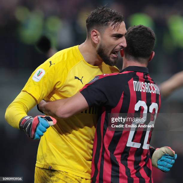 Gianluigi Donnarumma of AC Milan celebrates the victory with his team-mate Mateo Musacchio at the end of the Coppa Italia match between AC Milan and...