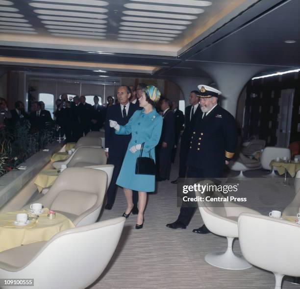 Queen Elizabeth II is shown around the new Cunard liner 'RMS Queen Elizabeth 2' or 'QE2' at Southampton by Cunard chairman Sir Basil Smallpeice , 1st...