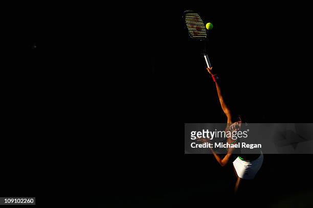 Ayumi Morita of Japan serves during her Round 1 match against Petra Kvitova of the Czech Republic during day two of the WTA Dubai Duty Free Tennis...
