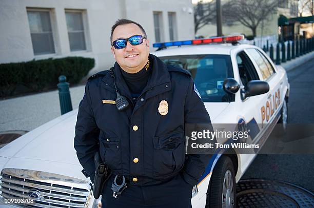 Capitol Police Officer Michael Riley poses for a picture outside of headquarters on D St., NE. Riley was selected Officer of the Month for February...