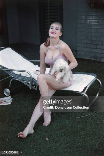 Swedish actress Anita Ekberg poses for a photo on April 22, 1956 in Palm Springs, California.