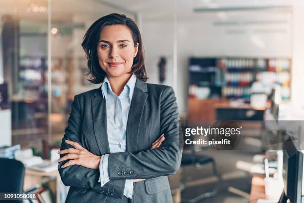 businesswoman - arms crossed stock pictures, royalty-free photos & images