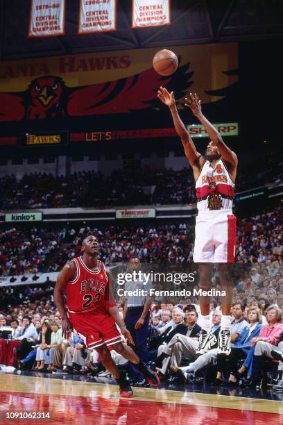 Steve Smith of the Atlanta Hawks shoots the ball against the Chicago Bulls on May 10, 1997 during Game Two of the NBA Eastern Conference Semifinals...