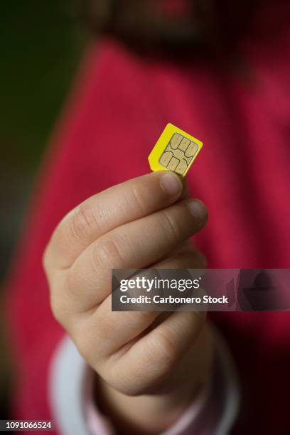 Hand Holding Sim Card Photos and Premium High Res Pictures - Getty Images