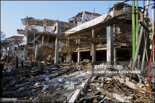 Kuta Car Bomb Attack Aftermath In Bali On October 15Th, 2002 In Bali, Indonesia. Fbi Agents And Forensic Experts Examine Site Of The Sari Club Which...