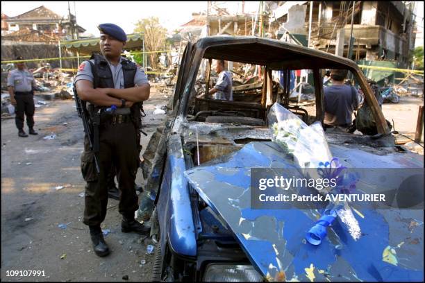 Kuta Car Bomb Attack Aftermath In Bali On October 15Th, 2002 In Bali, Indonesia. Indonesian Police On The Site Of The Sari Club In Kuta Which Was...