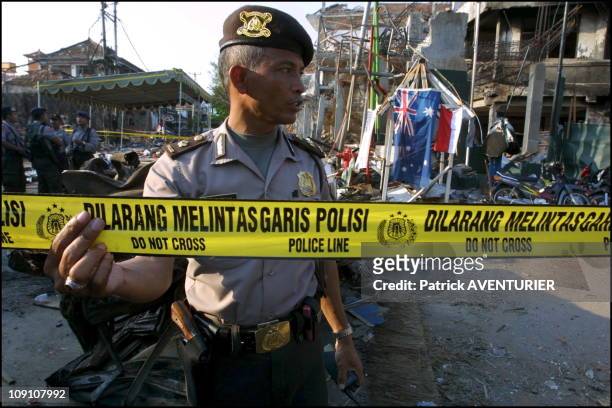 Kuta Car Bomb Attack Aftermath In Bali On October 15Th, 2002 In Bali, Indonesia. Indonesian Police On The Site Of The Sari Club In Kuta Which Was...