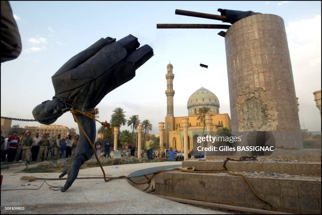 Operation Iraqi Freedom - Day 21: Us Troops Enter Central Baghdad And Topple Statue Of Saddam Hussein On April 9, 2003 In Baghdad, Iraq